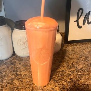 Starbucks peach color cup